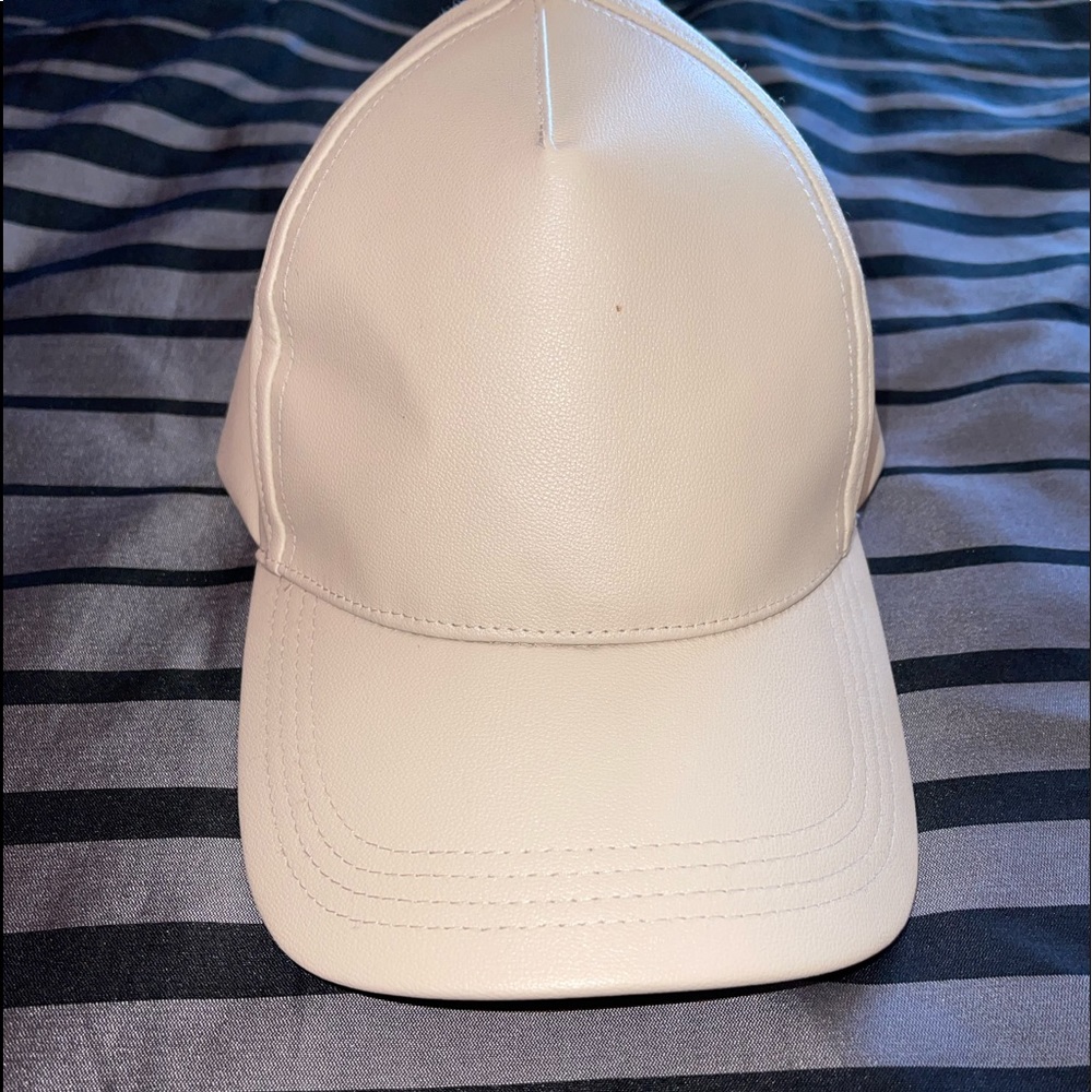 Light tan leather hat adjustable strap